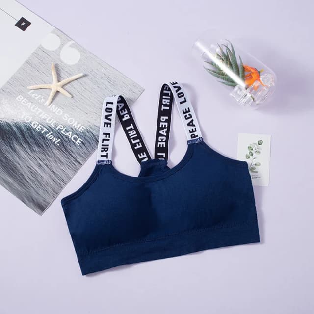 Reggiseno sportivo da donna con cinturino a lettera Intimo fitness sexy senza cuciture Top corto elastico sottile Gilet da yoga push up traspirante Abbigliamento sportivo