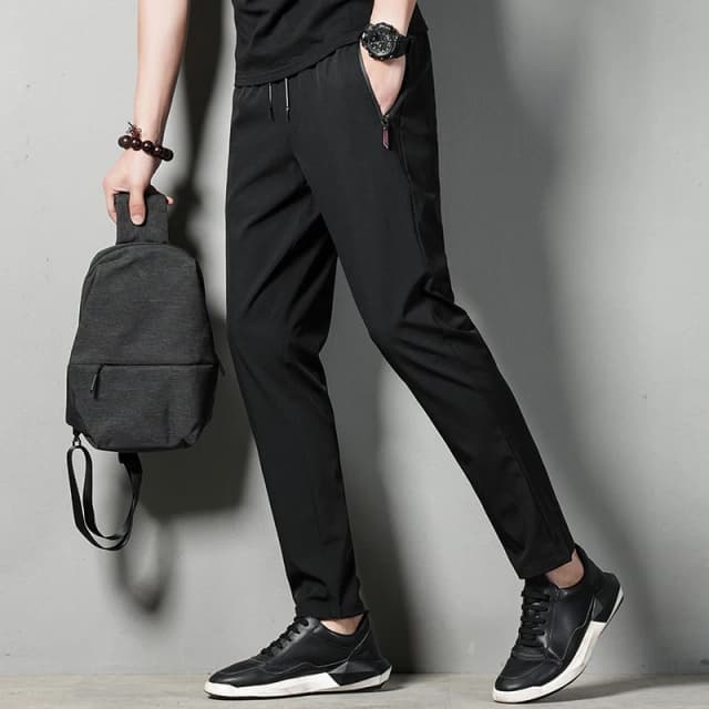Pantaloni casual da uomo estivi slim fit sottili versione coreana pantaloni di seta di ghiaccio Pantaloni sportivi Jinlun pantaloni a tubo dritto ad asciugatura rapida