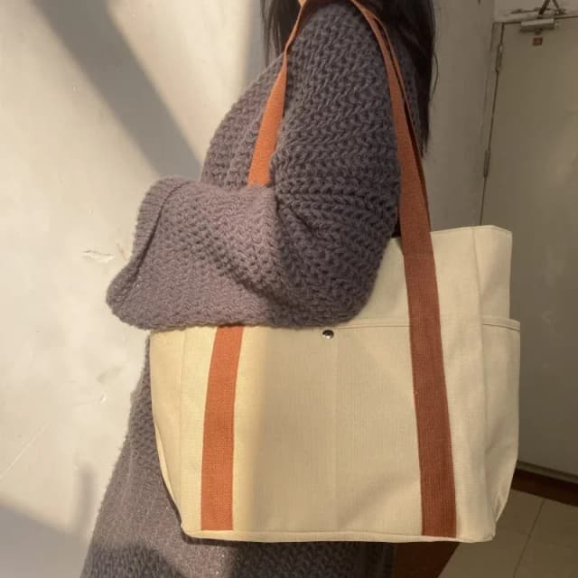 Borsa a tracolla di tendenza di Design di nicchia borsa a tracolla da donna minimalista Versatile alla moda borsa di tela portatile di grande capacità Unisex